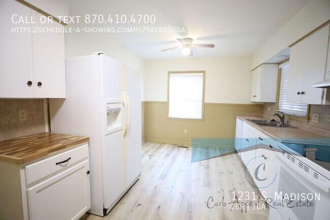 Building Photo - Spacious 2 bed / 1 bath duplex - covered p...