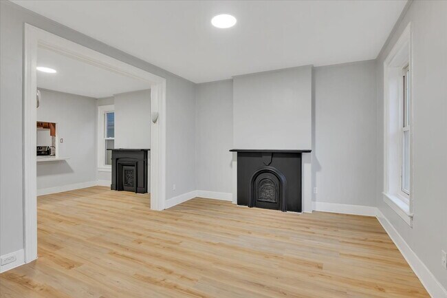 Building Photo - "Spacious 3-Bed Home at 57 1/2 Saratoga Av...