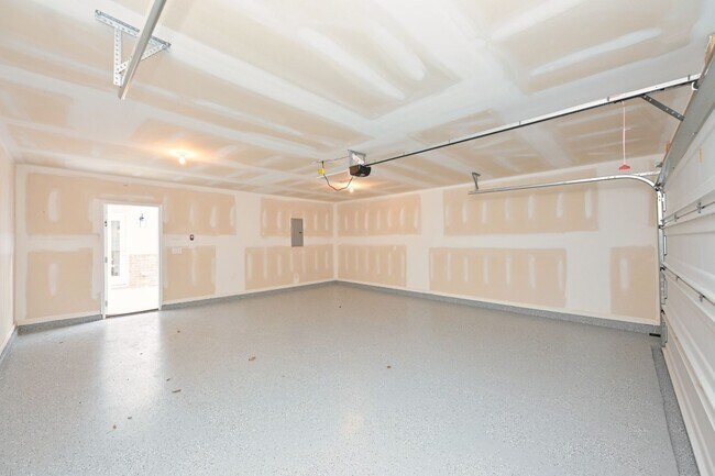 Building Photo - **BE THE LUCKY ONE TO LIVE IN THIS 2024-BUILT BRICK TOWNHOME IN THE VILLAS AT REGAL SQUARE FEATUR...