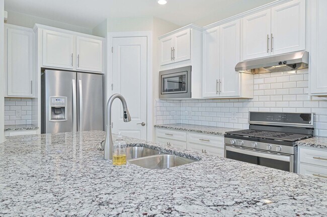 Building Photo - NOW AVAILABLE - 2/2 Plus Den Single Family Home in the Heart of Estero!