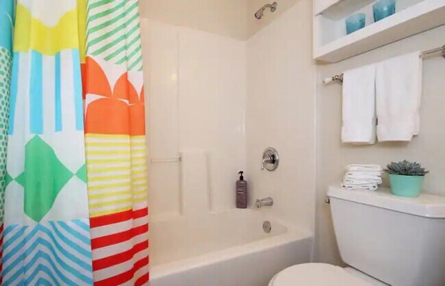 Building Photo - Stunning Duplex with Wrap Around Deck - Available Now