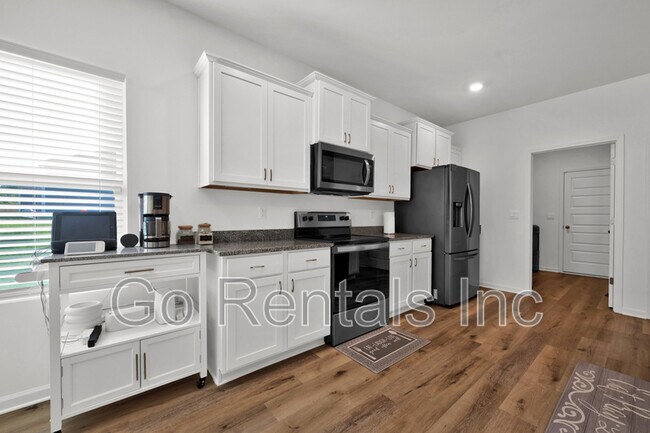Building Photo - 9426 Doss Ferry Ln
