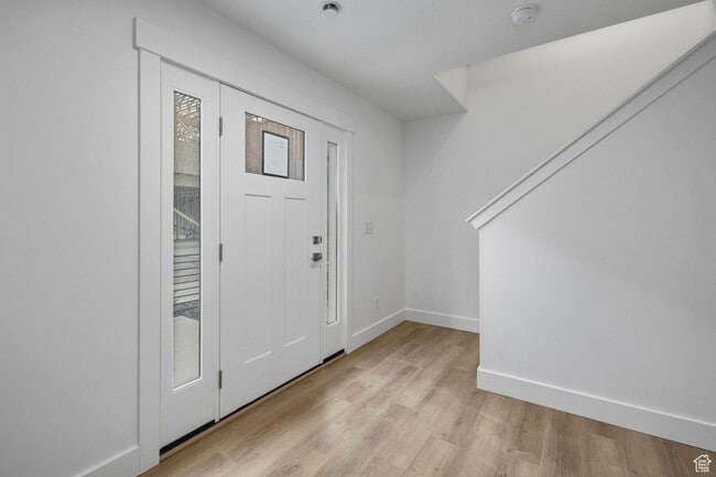 Building Photo - 3-bedroom, 2.5-bath townhome offering modern living in an unbeatable location.