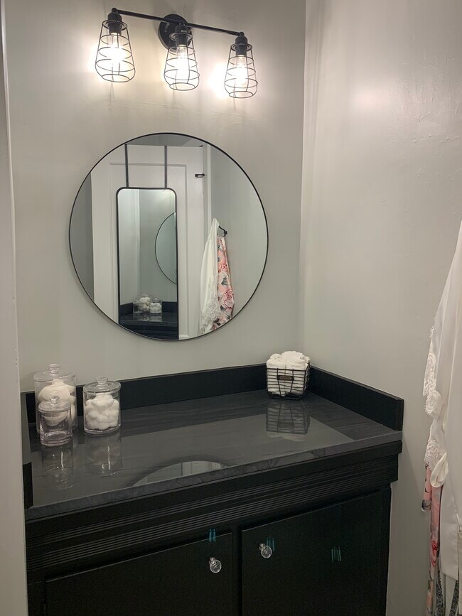 Additional vanity behind bathroom door - 1265 Jackson Ave