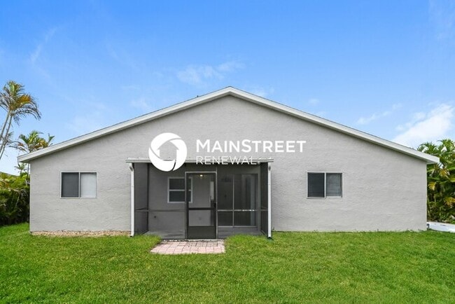 Building Photo - 3 Bedroom Pet-Friendly Home in CAPE CORAL, FL with Main Street Renewal