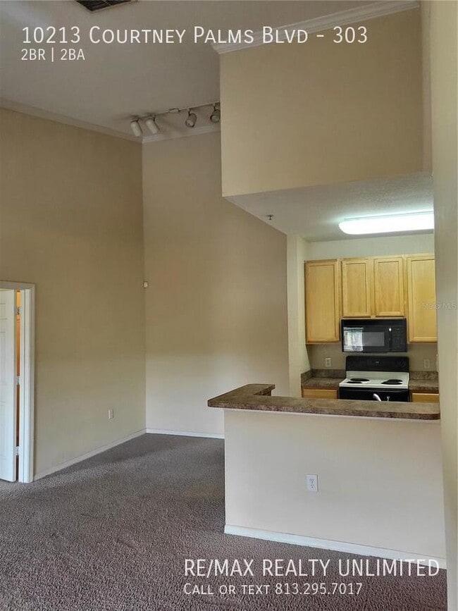 Building Photo - 10213 Courtney Palms Blvd