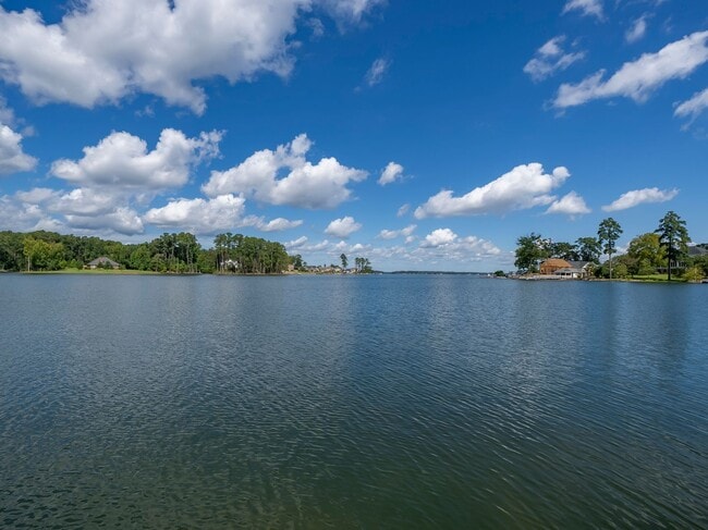 Building Photo - Partially Furnished Lakefront Retreat in Sunset Bay – Stunning Views & Resort-Style Amenities