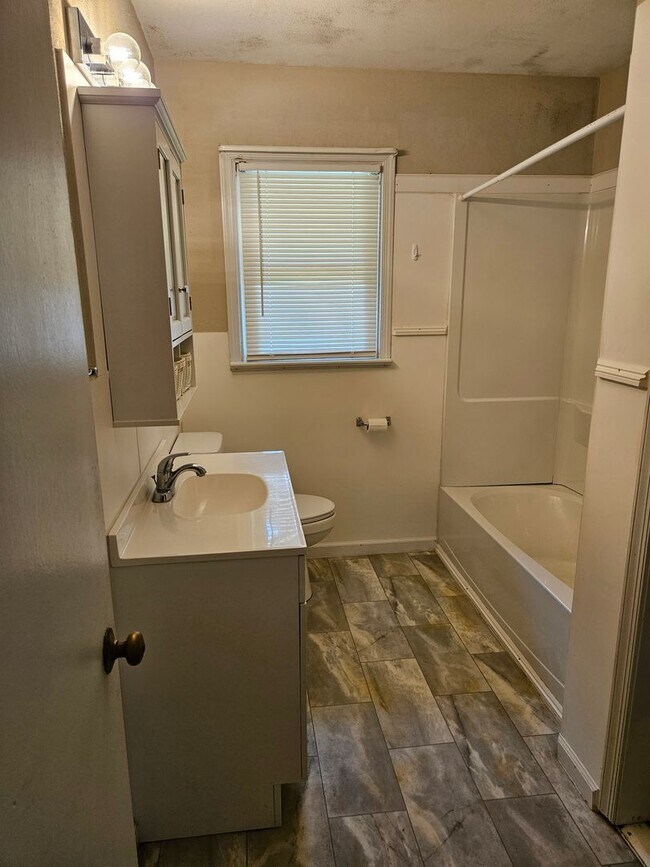 Building Photo - Charming Brick Rancher on Massive Lot – Move-In Ready!
