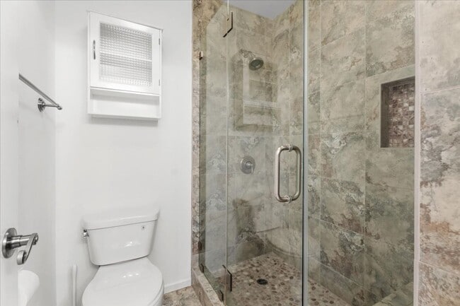 Building Photo - Private Street-Access Condo with Garage, Courtyard, Pool and Tennis