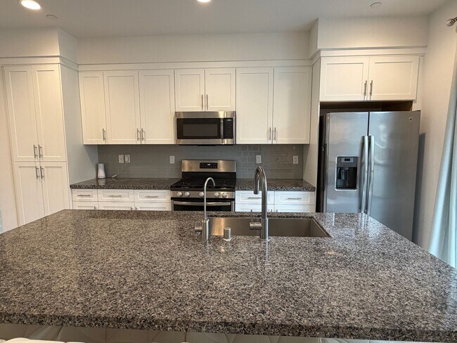 Building Photo - Smart, Modern 4-Bedroom Townhome Near Disneyland & Major Freeways