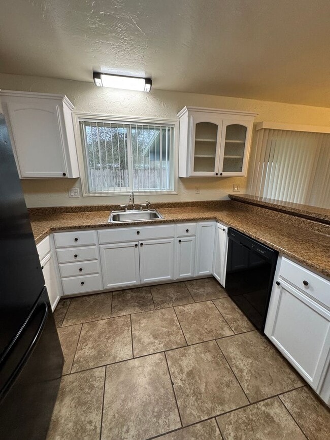 Building Photo - Winston 3 bedroom 2 bath with large storage shed and carport