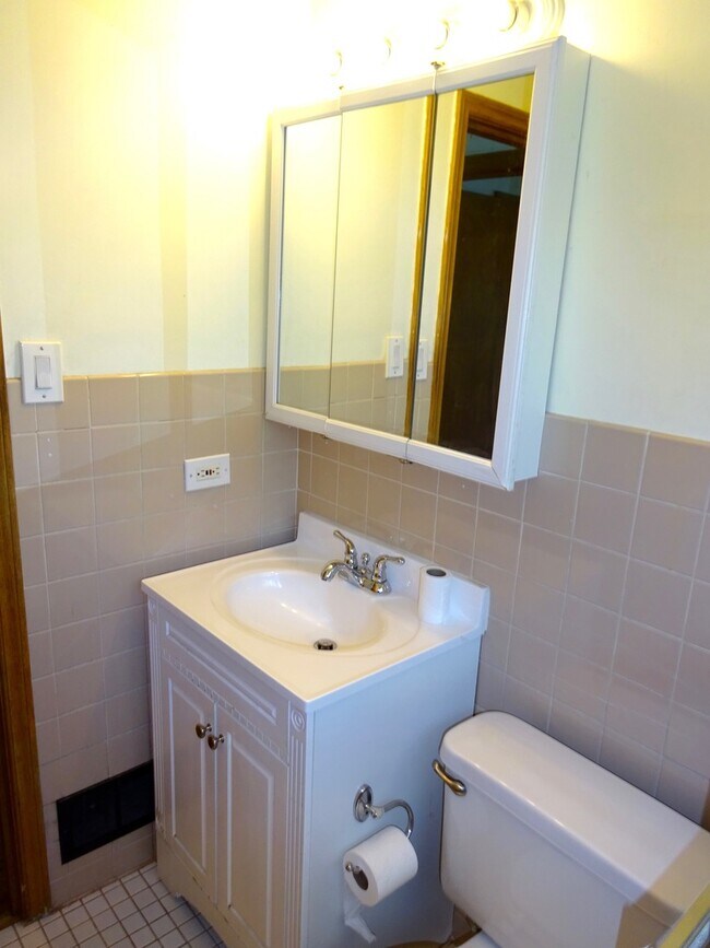 Building Photo - Two Bedroom Apartment With Hardwood Floors...