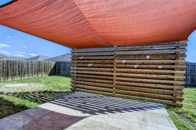 Building Photo - This well-maintained 4 bedroom home is located in a quiet neighborhood that has a community park ...