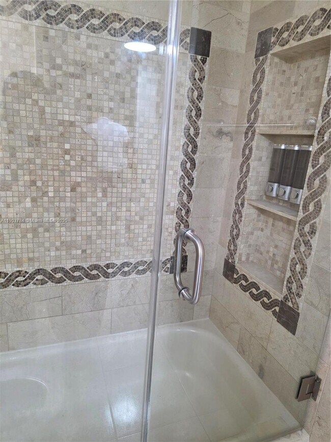 Building Photo - 9917 W Okeechobee Rd