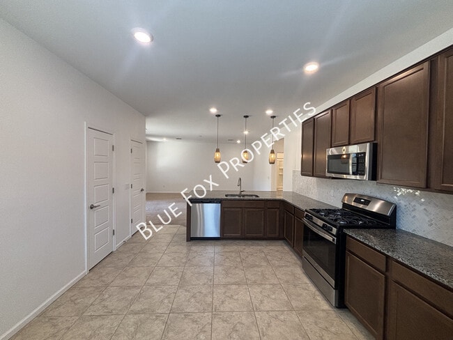 Building Photo - 7095 W Jadewood Ln