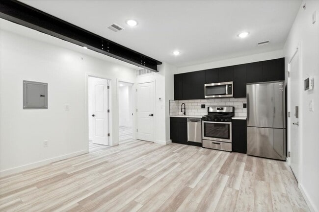 Building Photo - Modern, Spacious 2-Bedroom Apartment