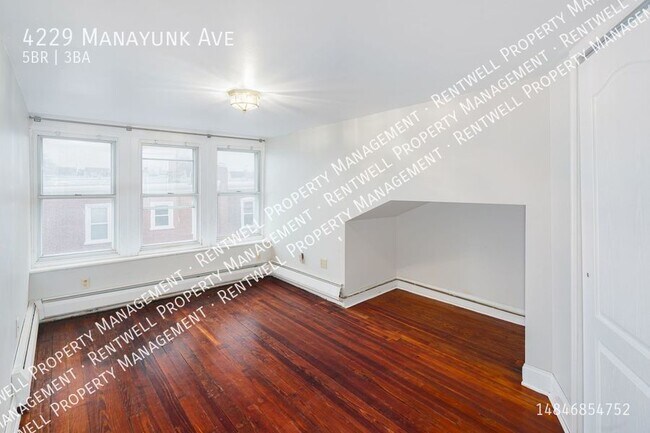 Building Photo - 5BR 2.5 BA_ 2,000 Sq Ft. Townhome in Manay...