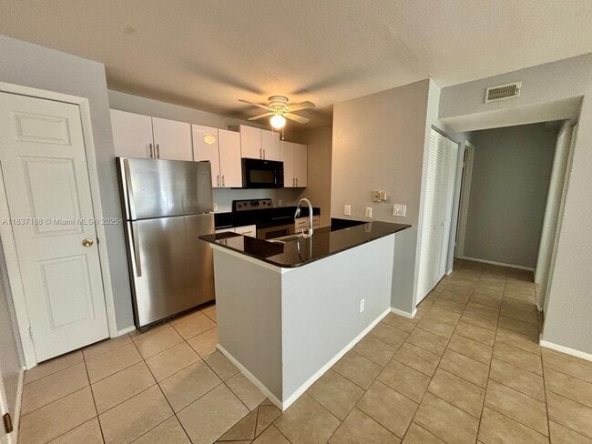 Building Photo - 1845 Palm Cove Blvd