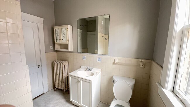 Building Photo - Spacious 4 Bedroom Midtown Home with Basement & Attic Storage