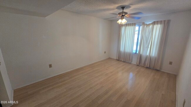 Building Photo - 9839 W Cedar Dr