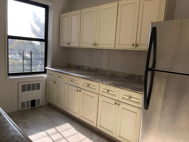 Building Photo - 10025 Queens Blvd