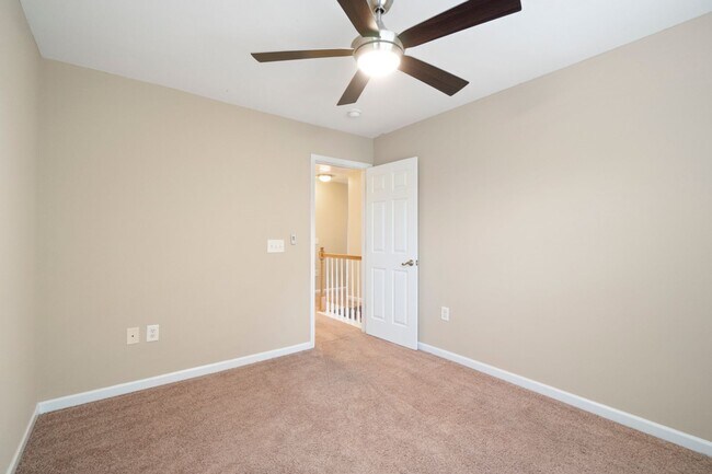 Building Photo - Located in Highland Creek