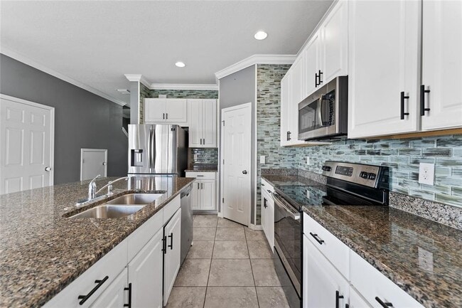 Building Photo - 7103 Grand Elm Dr