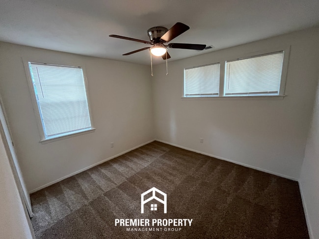 Building Photo - Spacious 3BR/2BA Home with Den & Living Room | Brick Fireplace & Large Yard