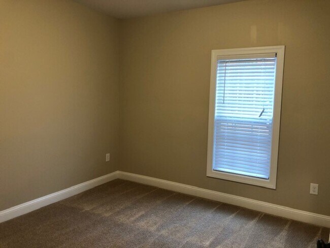 Building Photo - "Brand New Construction." Quiet location, charming, cozy 3 bedroom duplex