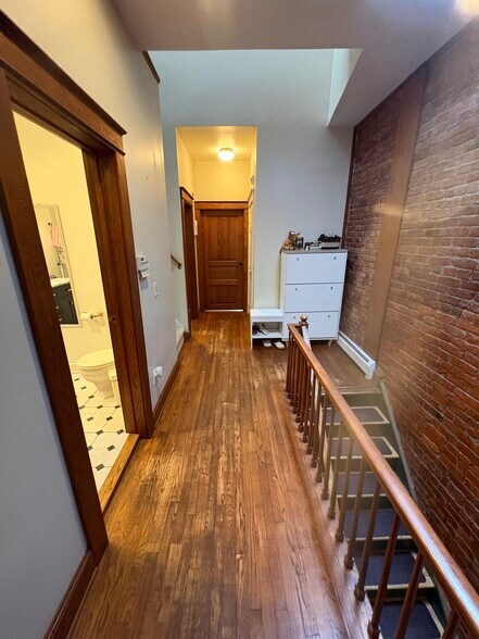 natural light from upon high, you could bowl in this hallways. Please do not bowl. But you could. - 342 Hudson Ave