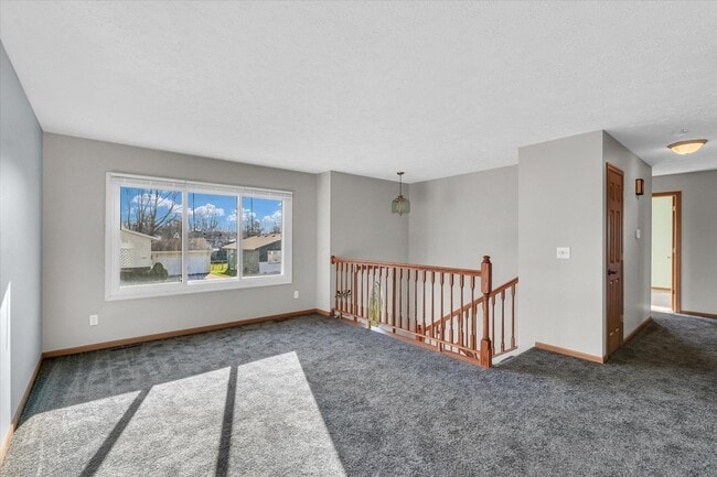 Building Photo - Spacious 4-Bedroom Home with Fenced Yard a...