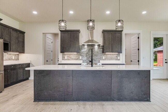 Building Photo - This luxurious new custom home in the sought-after Shadow Grove subdivision is a masterpiece of m...