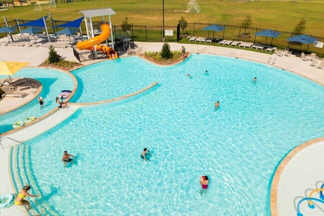 Building Photo - Live the Sunterra Lifestyle: Lagoon, Pool & More