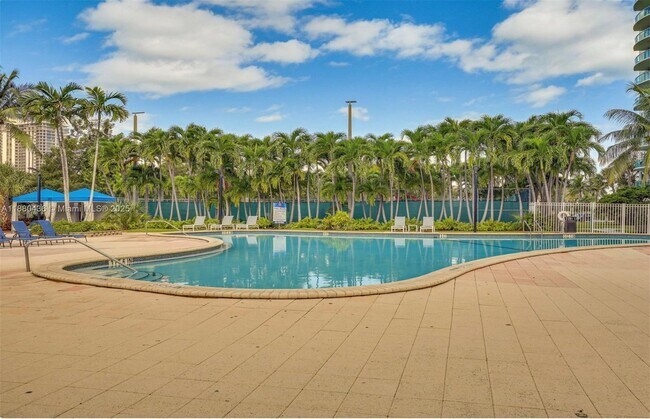 Building Photo - 19370 Collins Ave