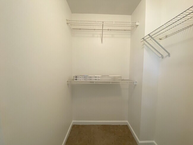 Building Photo - Spacious Three Bedroom Condo Located at The Reserve at Woodbridge!