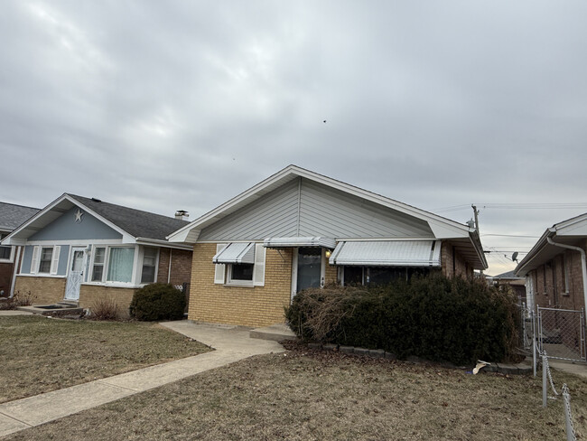 Building Photo - 7616 S Lorel Ave