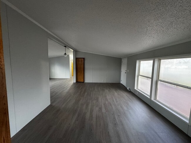 Building Photo - Very large yard great location a nice older doublewide Home