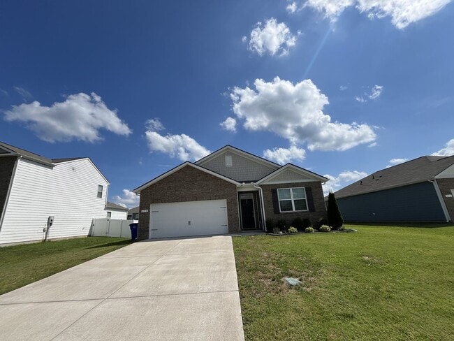 Building Photo - 4-Bedroom w/ Open Layout & Community Perks
