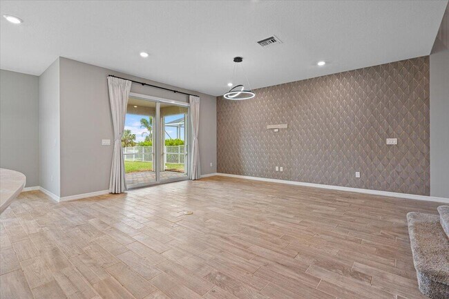 Building Photo - 10437 SW Captiva Dr