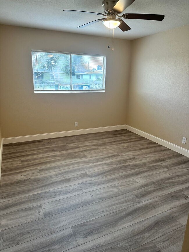 Building Photo - This cute home won't last long with a new ...