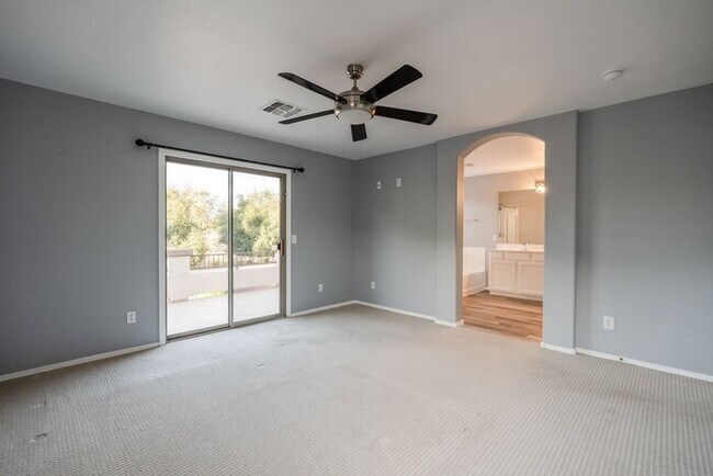 Building Photo - For Lease Beautifully Updated 4-bedroom, 2.5-Bathroom +Den, 1st Floor Office Gem, With a 2-car At...