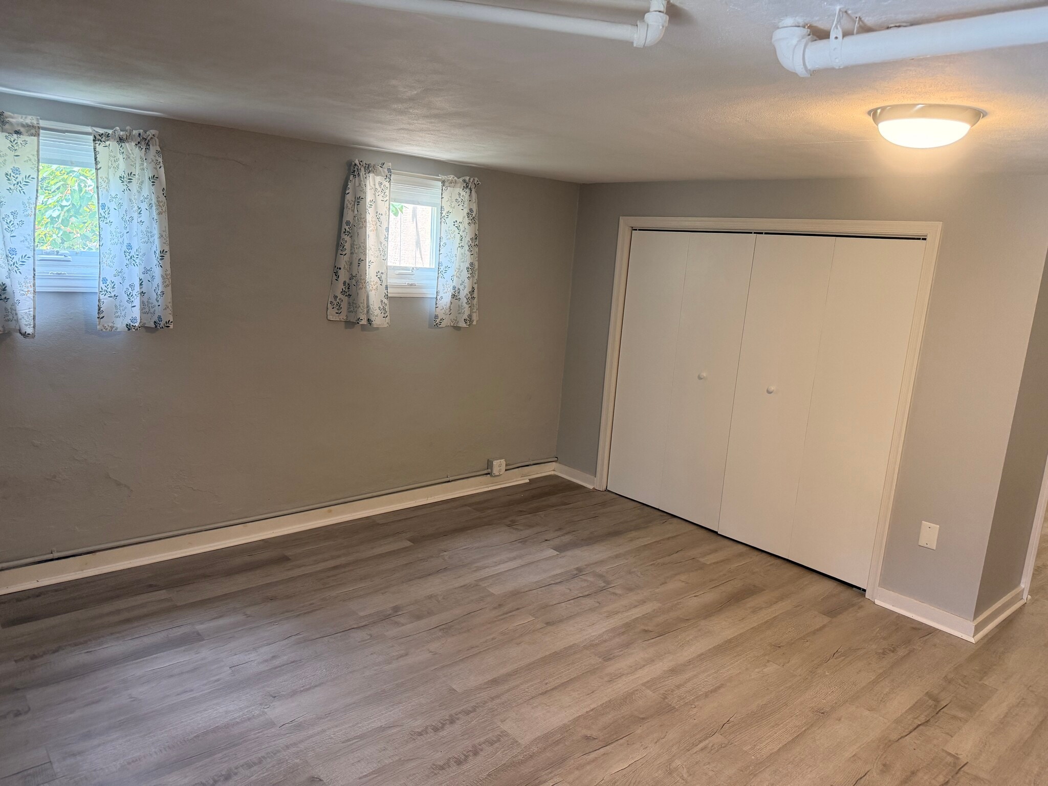 Wall to Wall Closet with Crank-out Windows in Bedroom (13' x15') - 201 Ridge Ave