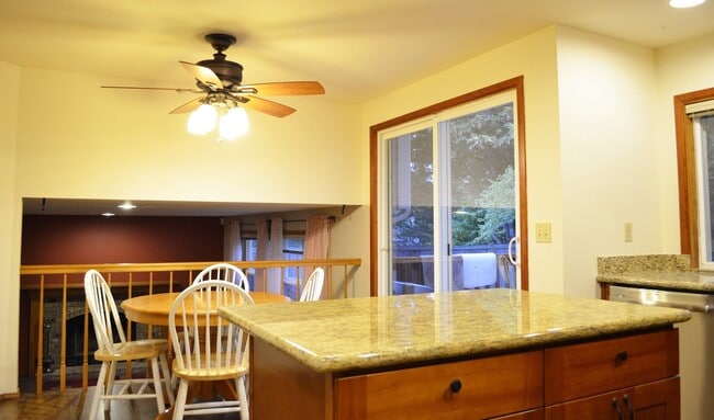 Building Photo - Private Summer Ridge Retreat with Vaulted Ceilings & Fenced Backyard