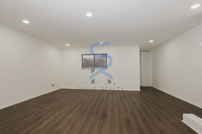 Building Photo - Move in before December 31st and choose your reward: a $250 Amazon Gift Card or a 55" Smart TV!