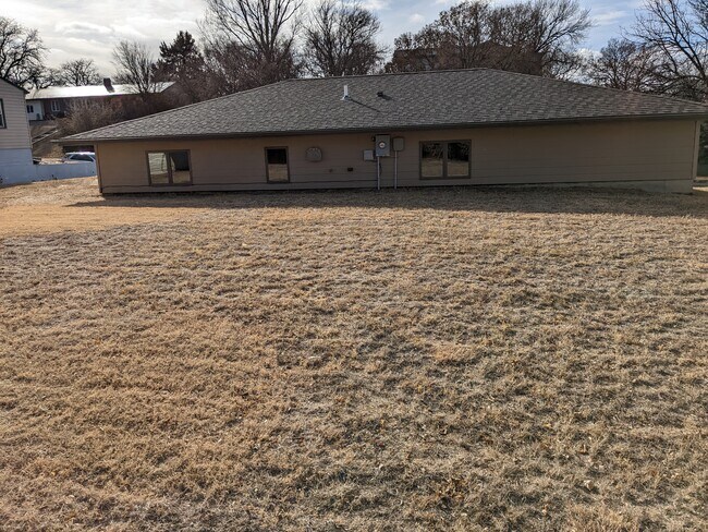 Back of House - 305 E Lawler Ave