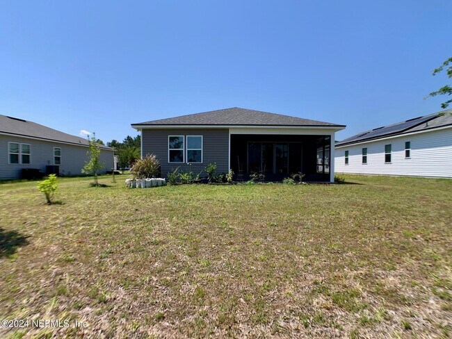 Building Photo - 1499 Tropical Pine Cove