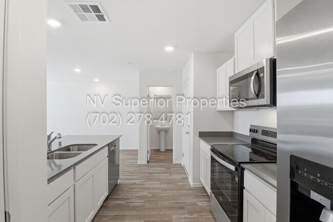 Building Photo - Aliante!! Never lived in!!! Gated!! Community Pool!!! Playground!! 2 Car Garage!! Tankless Hot wa...