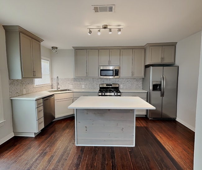 Building Photo - Designer Updates, Timeless Charm & an Unbeatable Fort Worth Location!