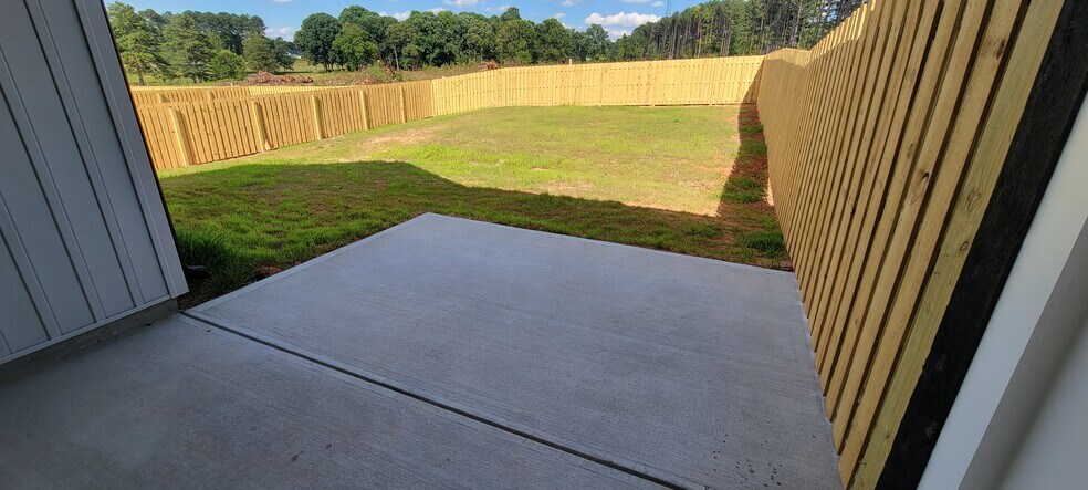 Fenced in unit A back yard - 905 W Chestnut Ext