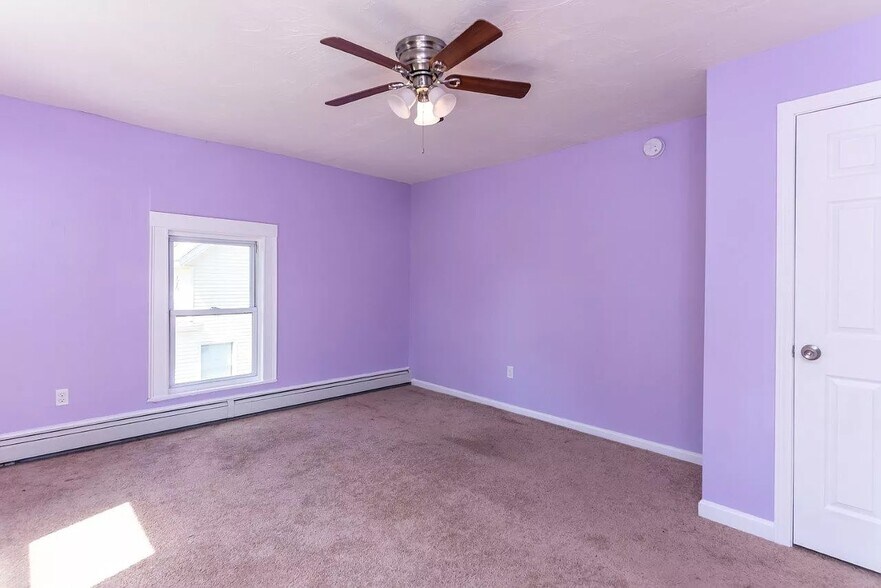 Purple room can be painted for free if desired before move-in. - 554 Lake Ave